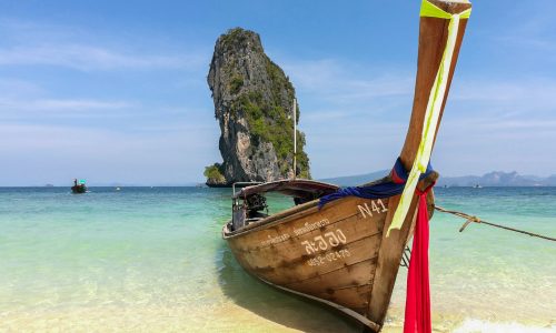 AO NANG, KRABI, THAILAND, 19 FEBRUARY 2017: One of Longtail boat parked to wait for tourists at Ao Nang.
